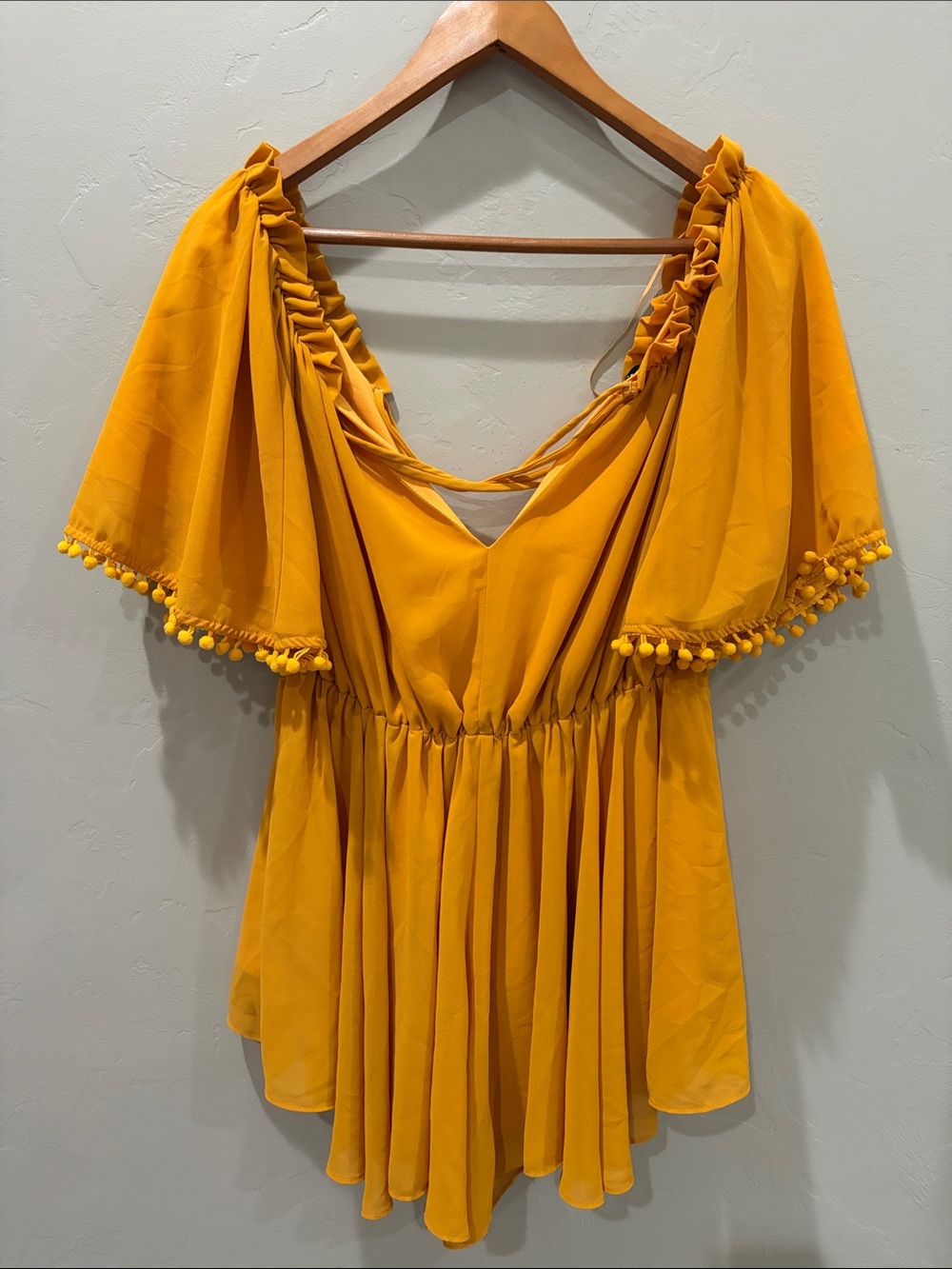 Vici Mustard Yellow Ruffled Romper with Pom Trim